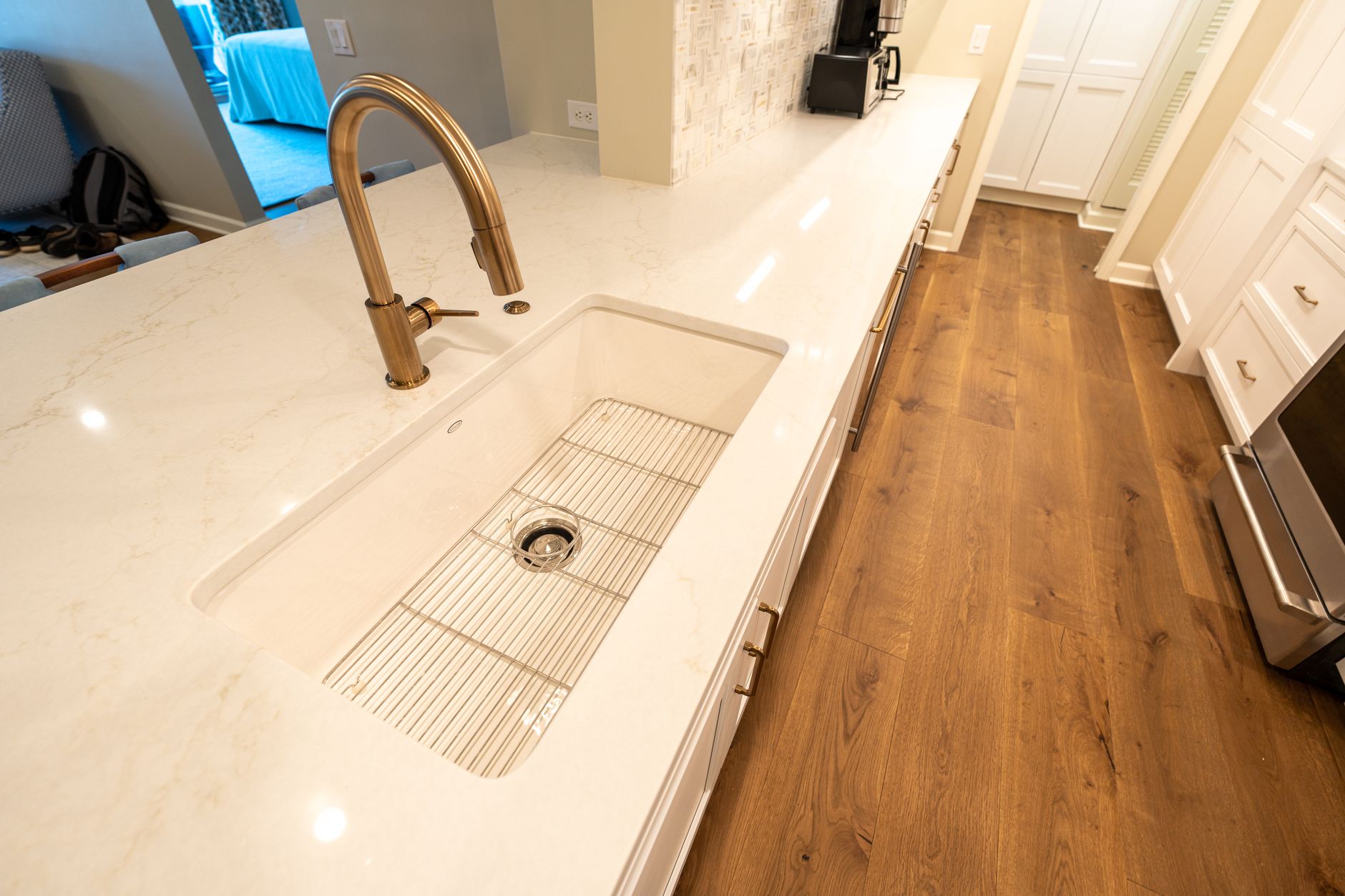 modern kitchen with marble countertop and sink